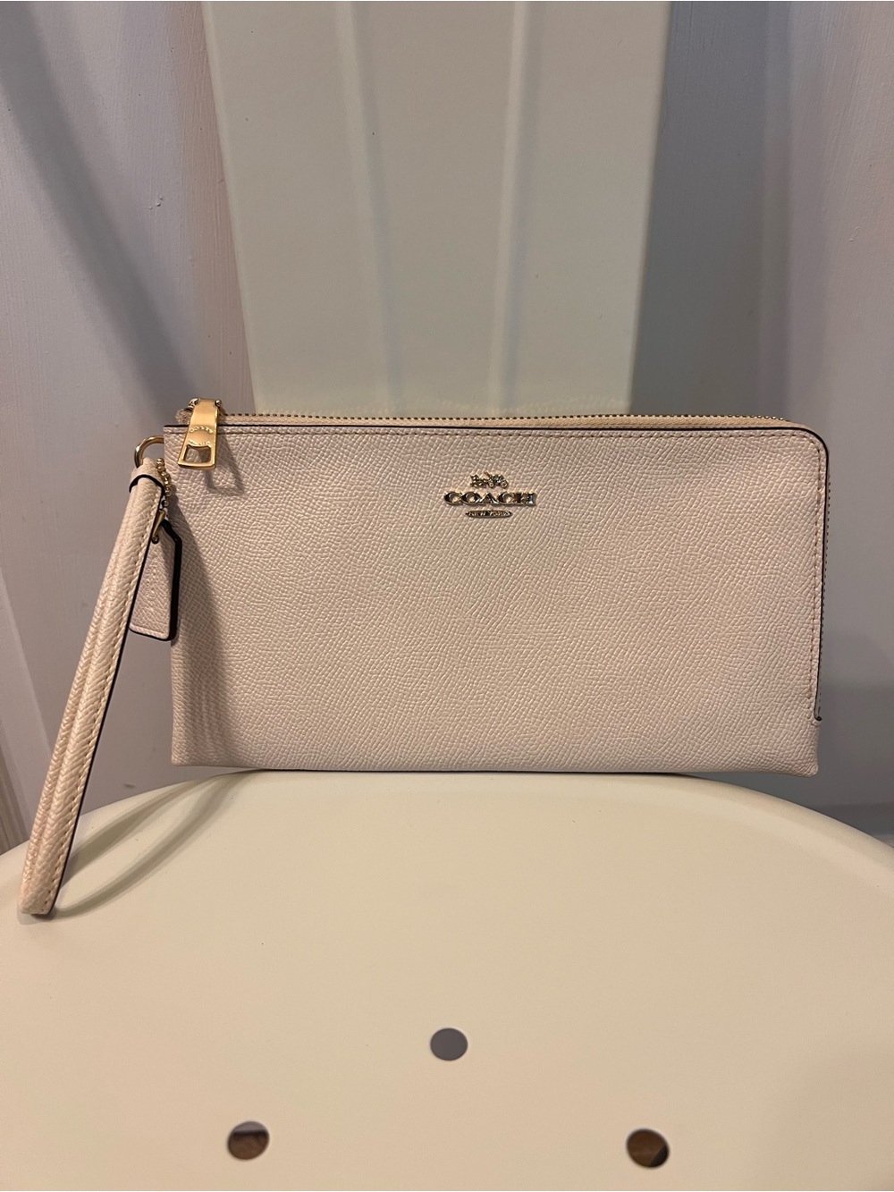 Coach Pebbled Leather Wristlet Clutch in Light Beige